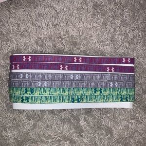 6 patterned Under Armour headbands